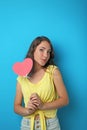 Young woman holding pink heart Royalty Free Stock Photo