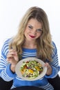Young Woman Holding Plate of Mixed Vegetables Royalty Free Stock Photo