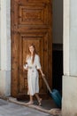 young woman holding purse and luggage Royalty Free Stock Photo