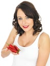 Young Woman Holding Red Chillies Royalty Free Stock Photo