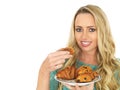 Young Woman Holding a Selection of Danish Pastries Royalty Free Stock Photo