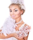 Young woman holding snowflake.