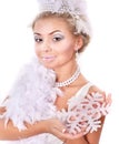 Young woman holding snowflake. Royalty Free Stock Photo