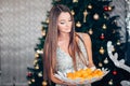 Young woman holding sweet mandarin, orange mood, diet and vegetarian, Holidays, celebration and people Royalty Free Stock Photo