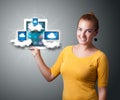Young woman holding tablet with modern devices in clouds Royalty Free Stock Photo