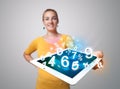 Young woman holding tablet with numbers Royalty Free Stock Photo