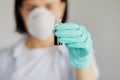 Young woman holding test tubes with blood and antidote in her hand Royalty Free Stock Photo