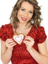 Young Woman Holding Valentines Ginger Biscuits Royalty Free Stock Photo