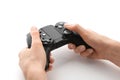 Young woman holding video game controller on white background Royalty Free Stock Photo