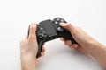 Young woman holding video game controller on white, closeup Royalty Free Stock Photo