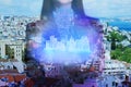 Young woman holding virtual image of city. Modern technology