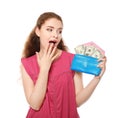 Young woman holding wallet with dollar banknotes on white background. Money savings concept Royalty Free Stock Photo