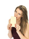 Young Woman Holding a White Chocolate Bar Royalty Free Stock Photo