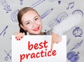 Young woman holding whiteboard with writing word: best practice. Technology, internet, business and marketing. Royalty Free Stock Photo