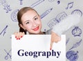 Young woman holding whiteboard with writing word: geography. Technology, internet, business and marketing.