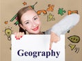 Young woman holding whiteboard with writing word: geography. Technology, internet, business and marketing.