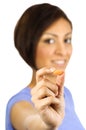 A young woman holds an orange pill. Royalty Free Stock Photo