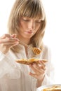 Young woman with honey and bread Royalty Free Stock Photo