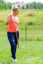 Young woman with hoola hoop outdoors Royalty Free Stock Photo