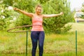 Young woman with hoola hoop outdoors Royalty Free Stock Photo