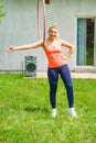 Young woman with hoola hoop outdoors Royalty Free Stock Photo