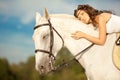 Young woman on a horse. Horseback rider, woman riding horse on b