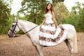 Young woman on a horse. Horseback rider, woman riding horse Royalty Free Stock Photo