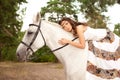 Young woman on a horse. Horseback rider, woman riding horse Royalty Free Stock Photo