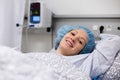 Young woman in hospital recovery room after surgery Royalty Free Stock Photo