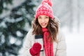 Young woman with hot drink in tumbler in winter Royalty Free Stock Photo