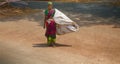 A young woman with a huge bag