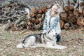 Young woman hugging her dog husky Royalty Free Stock Photo