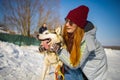 Young Woman With A Husky Dog Walking In Winter Park At Sunset Royalty Free Stock Photo