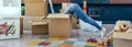 Woman inside a box preparing the move Royalty Free Stock Photo