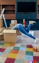 Woman inside a box preparing the move Royalty Free Stock Photo