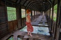 Woman inside bridge made from old abandoned train car in Georgia Royalty Free Stock Photo