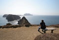 Young woman at Inspiration Point on East Anacapa Island in Channel Islands National Park, California. Royalty Free Stock Photo