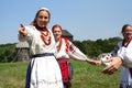 Young woman invites you to take part in the dance