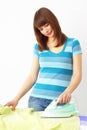 Young woman ironing Royalty Free Stock Photo