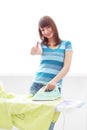 Young woman ironing