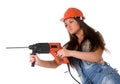 Young woman in jeans witch electric hammer drill Royalty Free Stock Photo