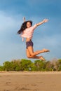 Young woman jumping