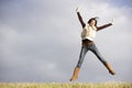 Young Woman Jumping In Air Royalty Free Stock Photo
