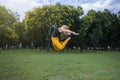 young woman jumping in the park Royalty Free Stock Photo