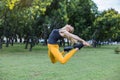 young woman jumping in the park Royalty Free Stock Photo