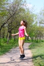 Young woman jumping with a skipping rope in a summ Royalty Free Stock Photo