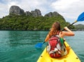 Young woman kayaking in Ang Thong National Marine Park, Thailand