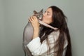 Young woman kissing pet cat Royalty Free Stock Photo