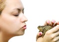 Woman kissing a toad Royalty Free Stock Photo