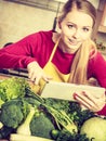 Woman having green vegetables thinking about cooking Royalty Free Stock Photo